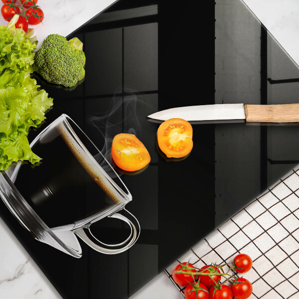 Glas Ceranfeldabdeckung Ein Glas heißer Kaffee