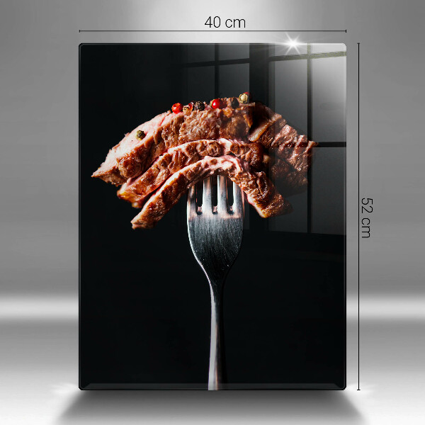 Glas Ceranfeldabdeckung Fleisch auf einer Gabel