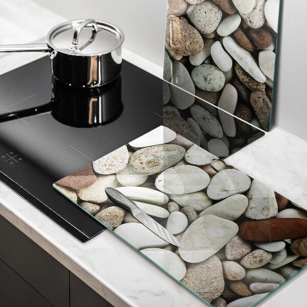 Glas Herdabdeckplatte Kleine Steine im Hintergrund