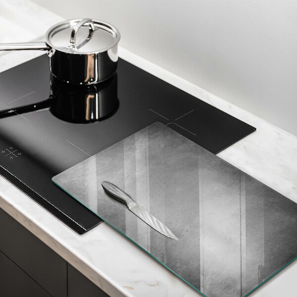 Glas Ceranfeldabdeckung Spritzschutz Betonbeschaffenheitshintergrund