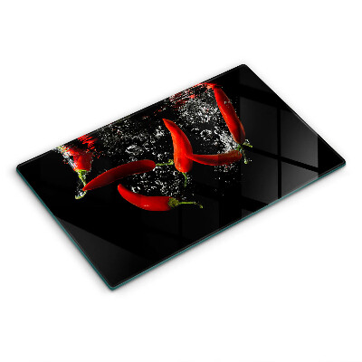 Glas Herdabdeckplatte Chilischoten in Wasser