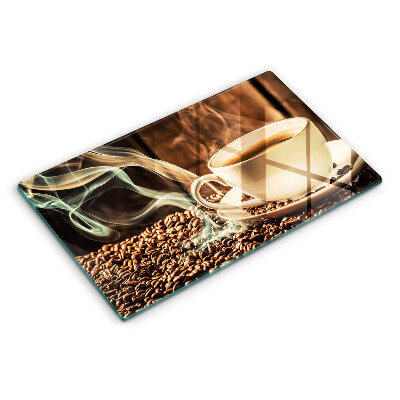 Glas Herdabdeckplatte Tasse und Kaffeebohnen