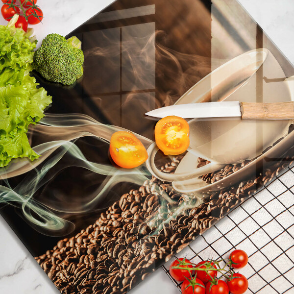 Glas Herdabdeckplatte Tasse und Kaffeebohnen