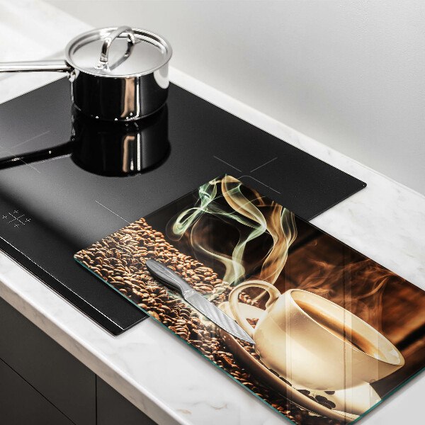 Glas Herdabdeckplatte Tasse und Kaffeebohnen