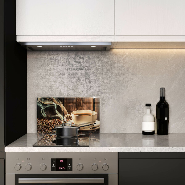 Glas Herdabdeckplatte Tasse und Kaffeebohnen