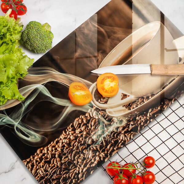 Glas Herdabdeckplatte Tasse und Kaffeebohnen