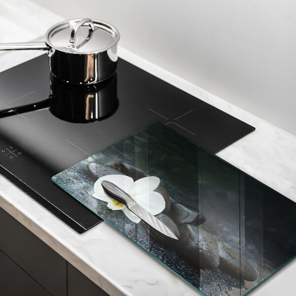 Glas Herdabdeckplatte Zen-Steine mit weißen Blüten
