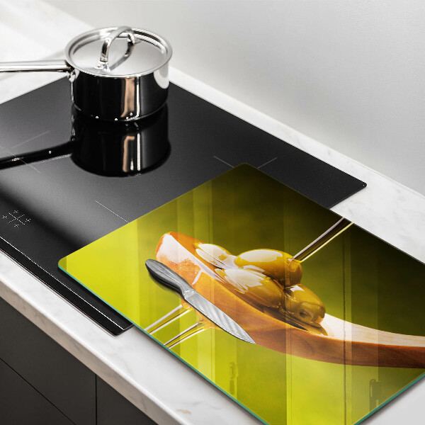 Glas Herdabdeckplatte Olivenöl und Oliven