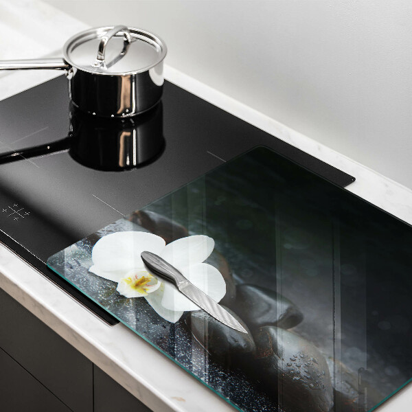 Glas Herdabdeckplatte Zen-Steine mit weißen Blüten