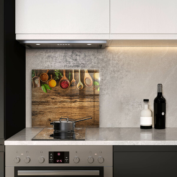 Glas Herdabdeckplatte Holzlöffel mit Gewürzen