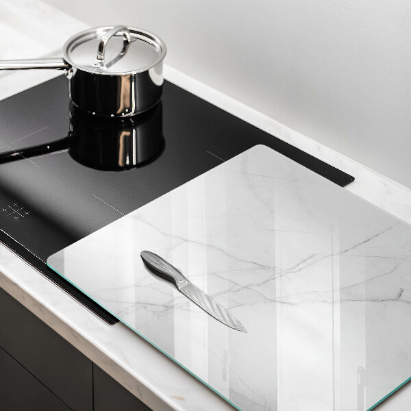 Glas Herdabdeckplatte Marmorsteinhintergrund