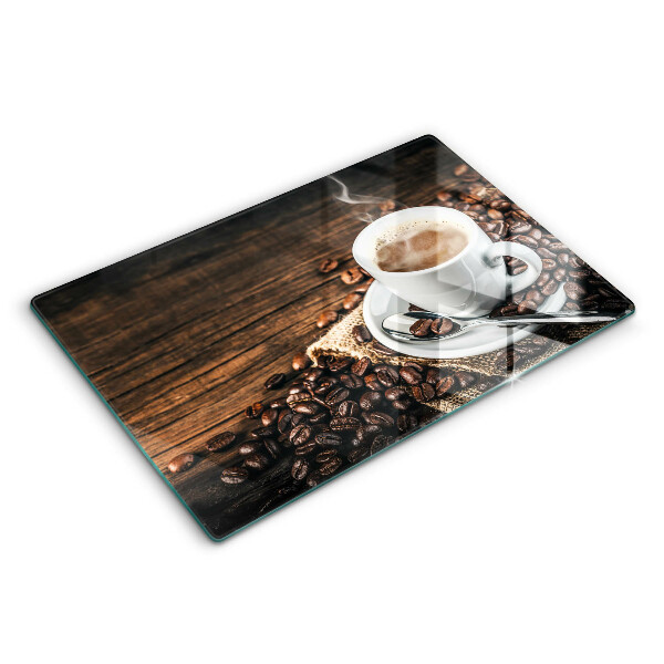 Glas Ceranfeldabdeckung Tasse und Kaffeebohnen