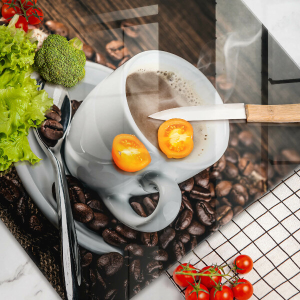 Glas Ceranfeldabdeckung Tasse und Kaffeebohnen