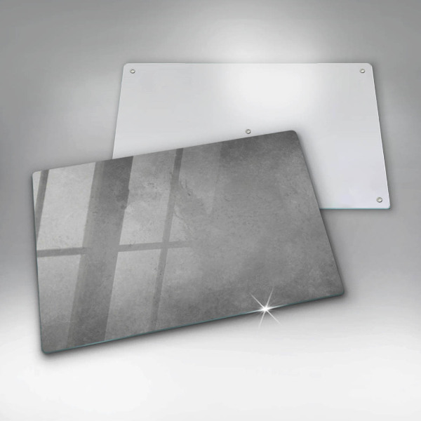 Glas Herdabdeckplatte Betonbeschaffenheitshintergrund