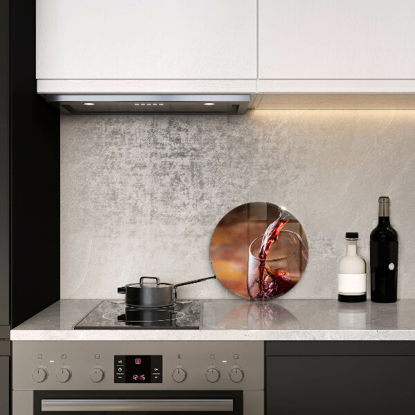 Glas Ceranfeldabdeckung Spritzschutz Rotwein und ein Glas