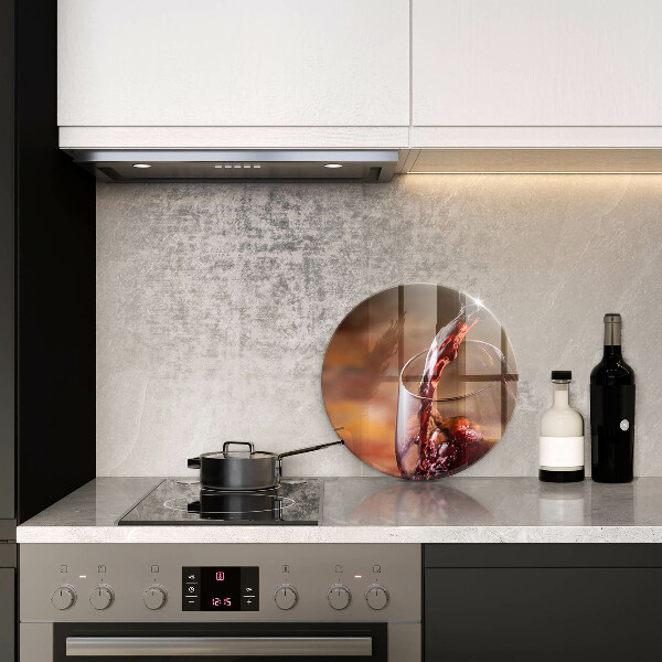 Glas Ceranfeldabdeckung Spritzschutz Rotwein und ein Glas