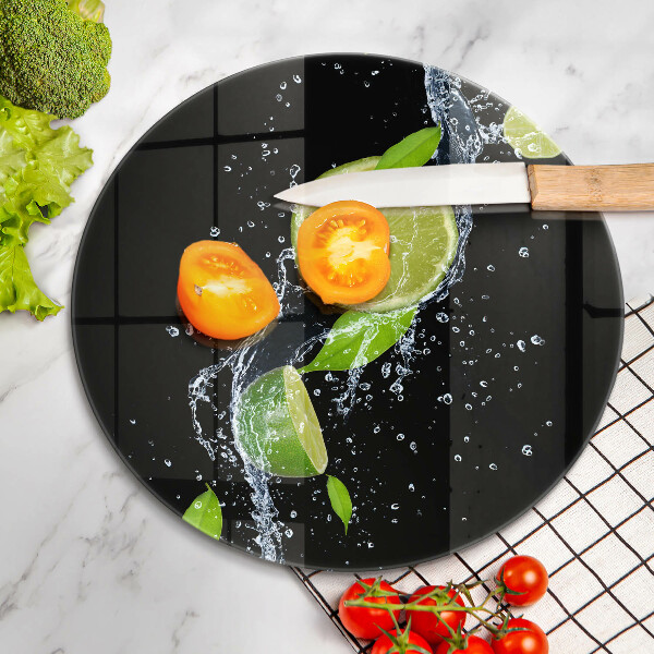 Glas Herdabdeckplatte Saftige Limetten in Wasser