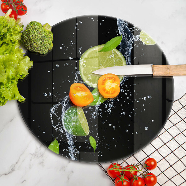 Glas Herdabdeckplatte Saftige Limetten in Wasser