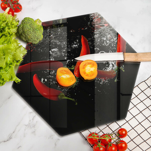 Glas Herdabdeckplatte Chilischoten in Wasser