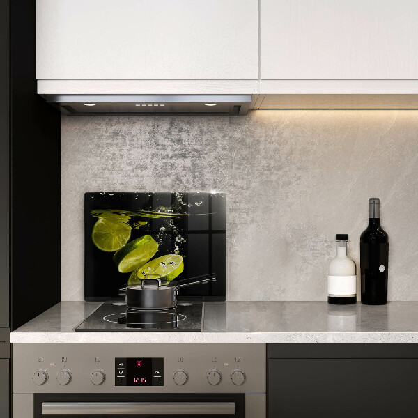 Herdabdeckplatte glas Limetten im Wasser