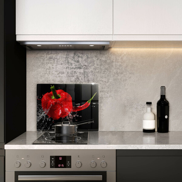 Herdabdeckplatte glas Rote Paprika in Wasser