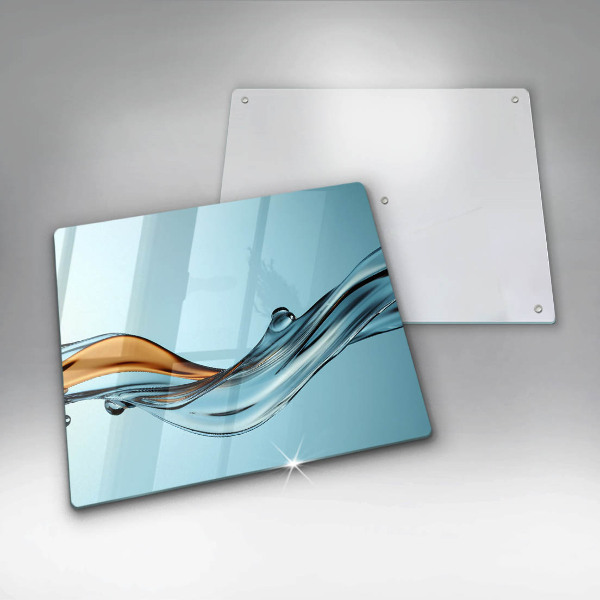 Herdplattenabdeckung Wasser auf blauem Hintergrund