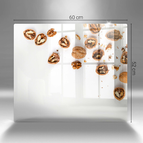 Herdplattenabdeckung Nüsse auf weißem Hintergrund