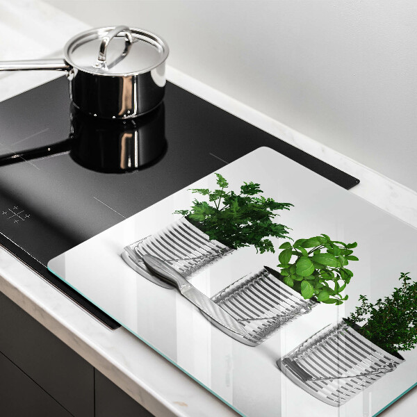 Herdplattenabdeckung Töpfe mit Kräuterpflanzen