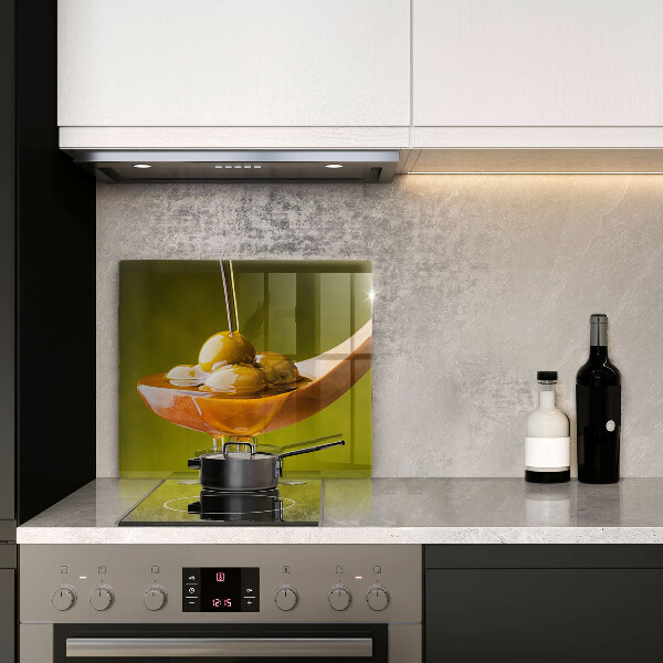 Herdplattenabdeckung Olivenöl und Oliven