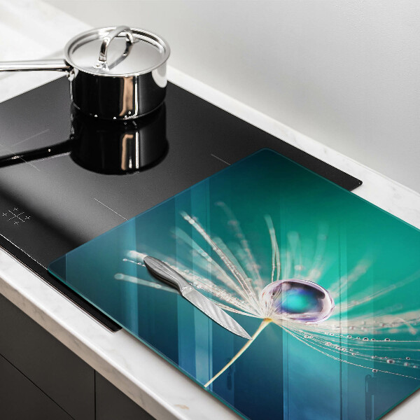 Ceranfeld schutz Tau auf einem Löwenzahn