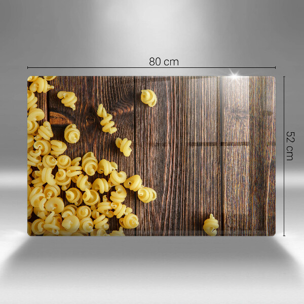 Herdabdeckplatte glas Nudeln auf dem Tisch