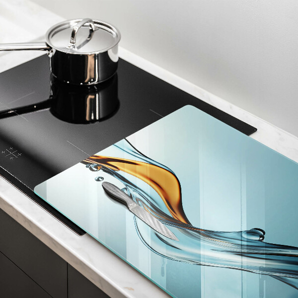 Herdabdeckplatte glas Wasser auf blauem Hintergrund