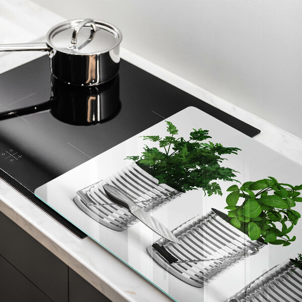 Herdabdeckung Töpfe mit Kräuterpflanzen