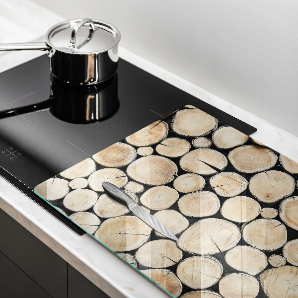 Herdabdeckung Baumstämme aus Holz