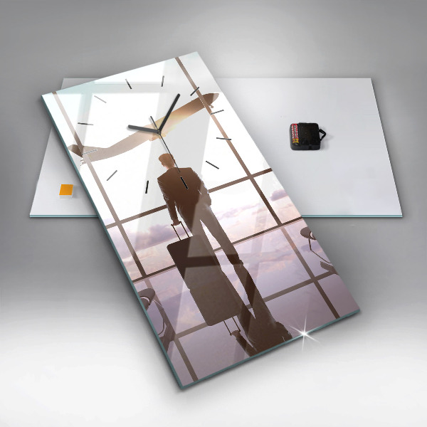 Vertikale Uhr Mann auf dem Flughafen