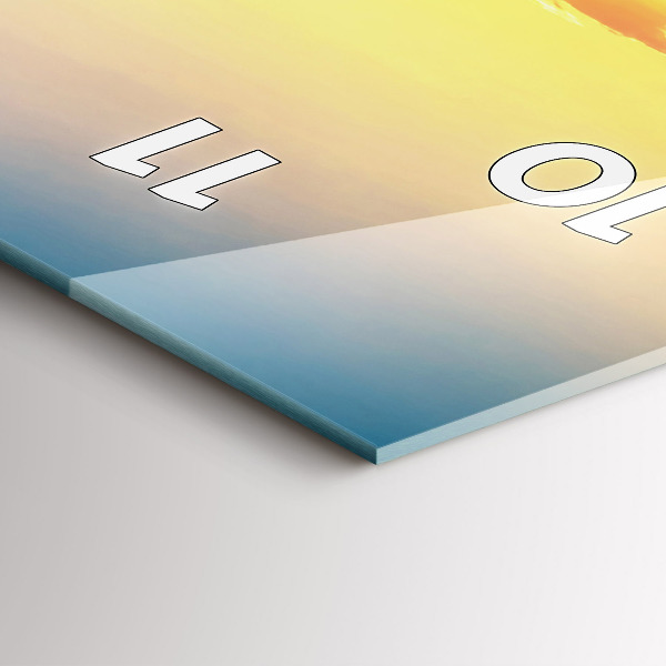 Vertikale Uhr Sonnenuntergang über den Hügeln