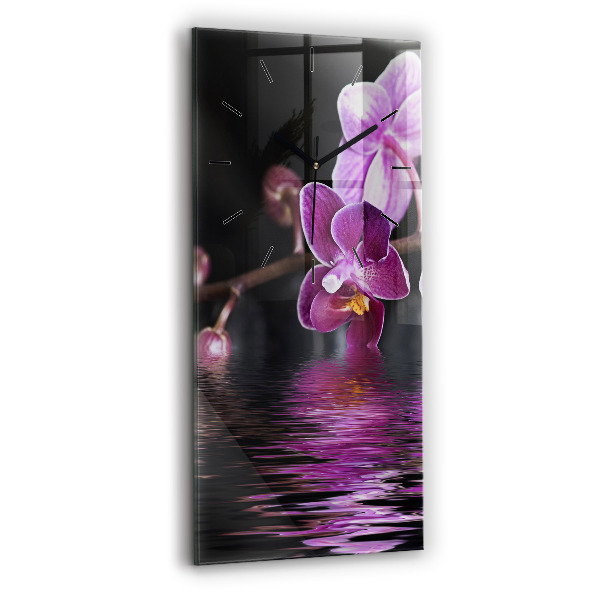 Vertikale Uhr mit motiv Orchideenblüte auf dem Wasser