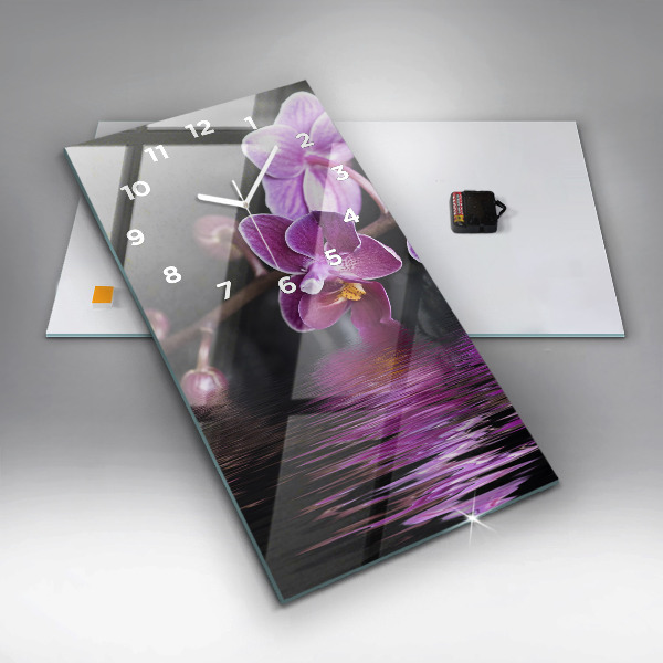 Vertikale Uhr mit motiv Orchideenblüte auf dem Wasser