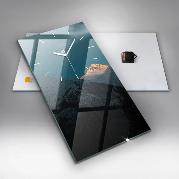 Vertikale Uhr mit motiv Sonnenuntergang in den Bergen