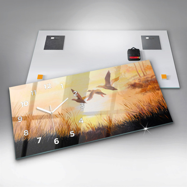 Horizontale Uhr mit motiv Kraniche bei Sonnenuntergang