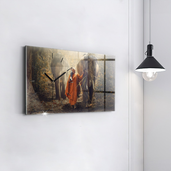 Horizontale Uhr Mönch führt Elefanten