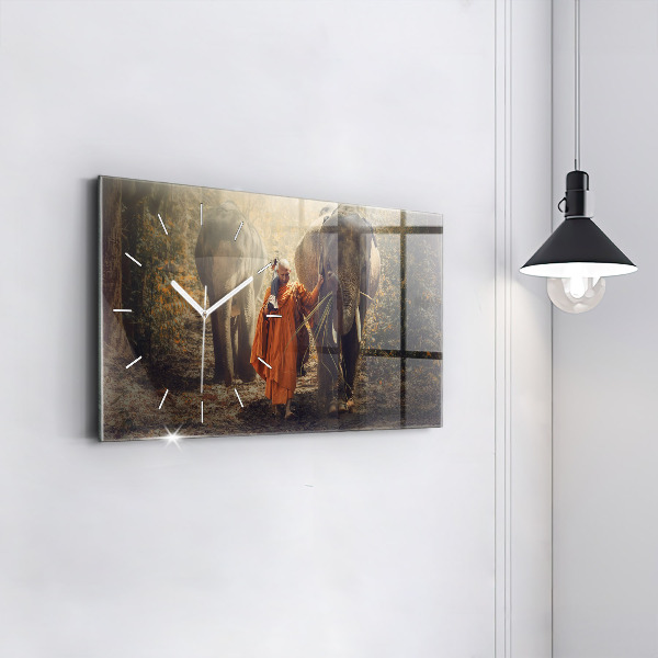 Horizontale Uhr Mönch führt Elefanten