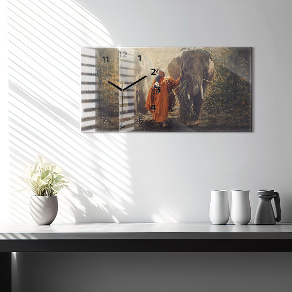 Horizontale Uhr Mönch führt Elefanten