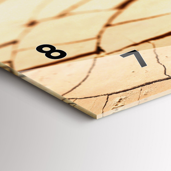 Horizontale Uhr mit motiv Pflanze in getrockneter Erde