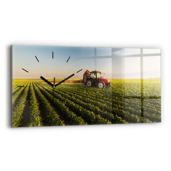 Horizontale Uhr mit motiv Traktor sprüht ein Feld