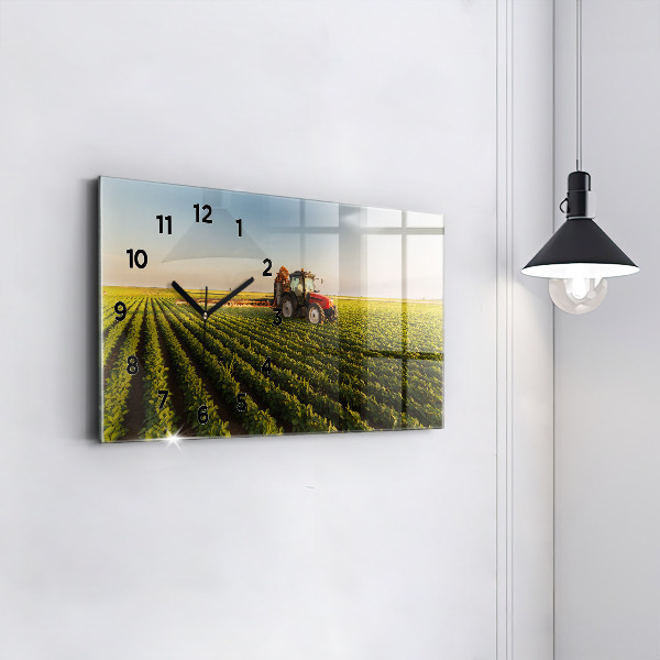 Horizontale Uhr mit motiv Traktor sprüht ein Feld