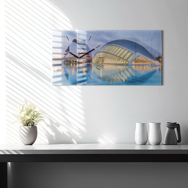 Horizontale Uhr mit motiv Sonnenuntergang in der Stadt