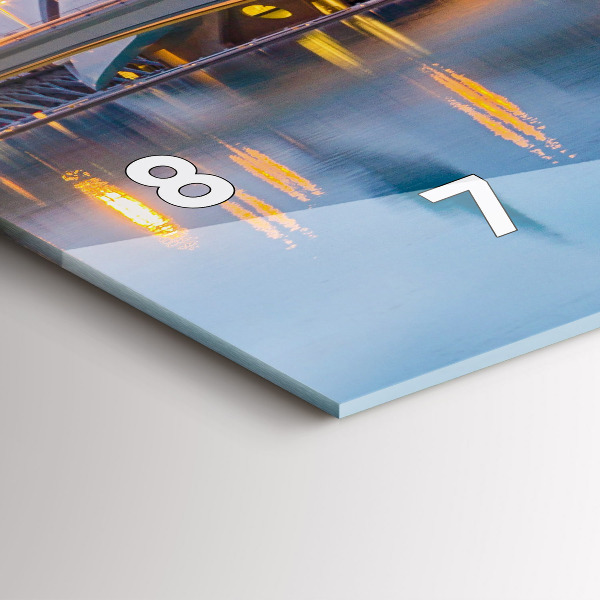 Horizontale Uhr mit motiv Sonnenuntergang in der Stadt