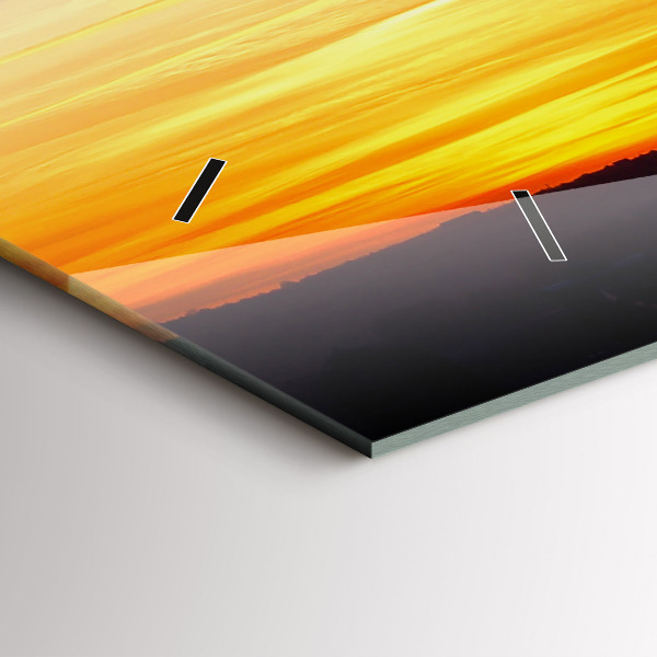 Horizontale Uhr Gebäude und Sonnenuntergang