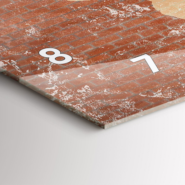 Horizontale Uhr Weltkarte auf einem Ziegelstein